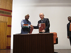 Photo of the signing ceremony with Dr. Vijay Raghavan