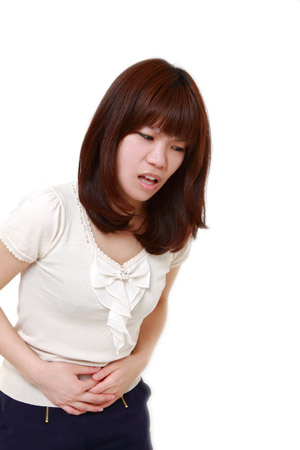 Image of a woman with stomachache