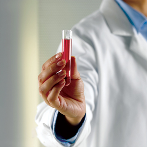 Image of a researcher with a test tube