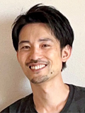 田坂 元一 上級研究員の写真