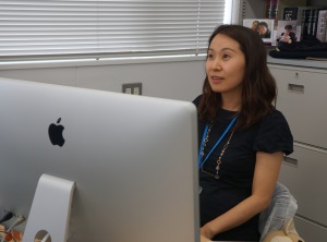 Image of Sakai at her office