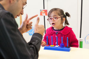 Image of a child and a man