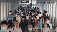 Photo of people wearing masks